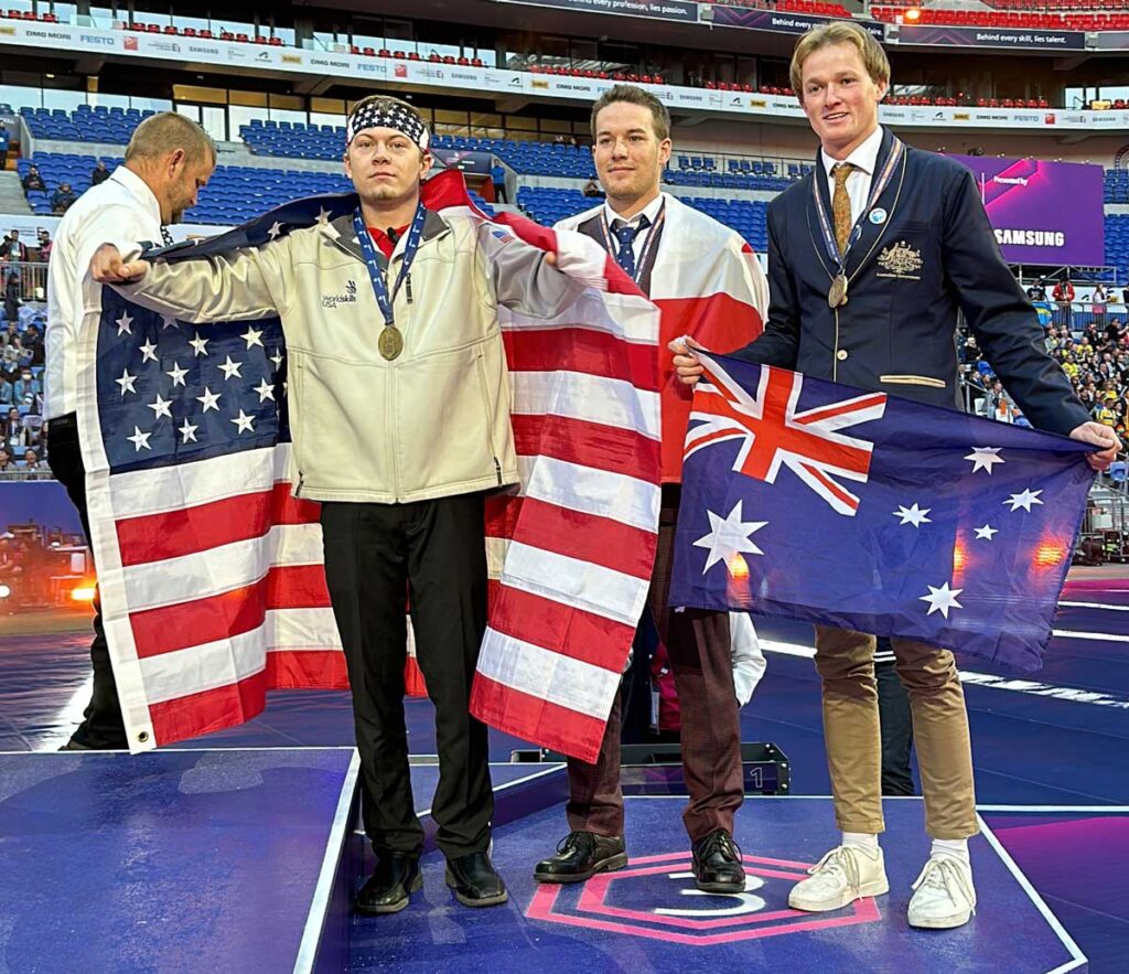 Photo of Wyatt Hansen with the other bronze medalists