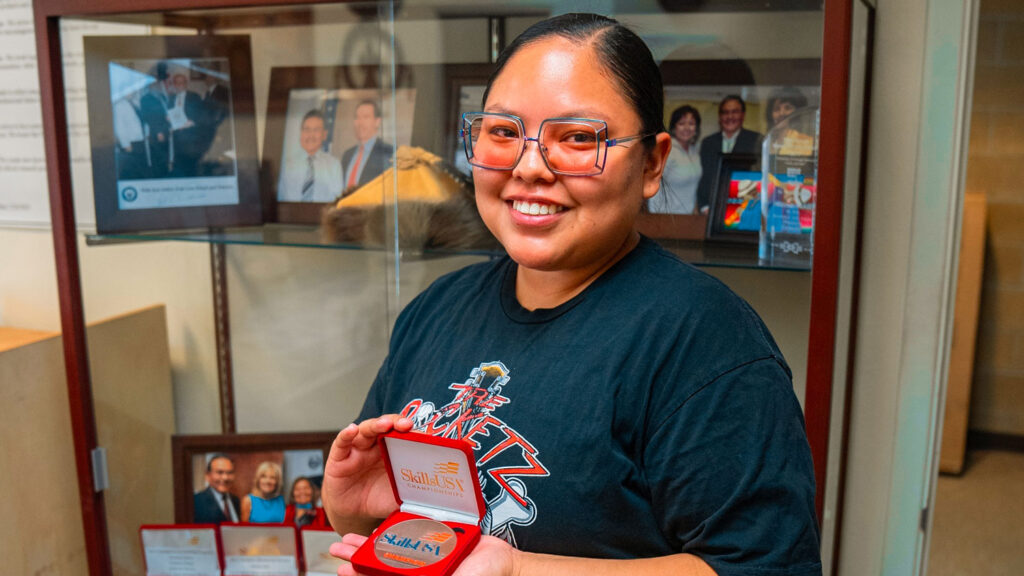 Photo of Angel Joe and her bronze medal.